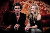 Avril Lavigne Sitting With Tyson Ritter