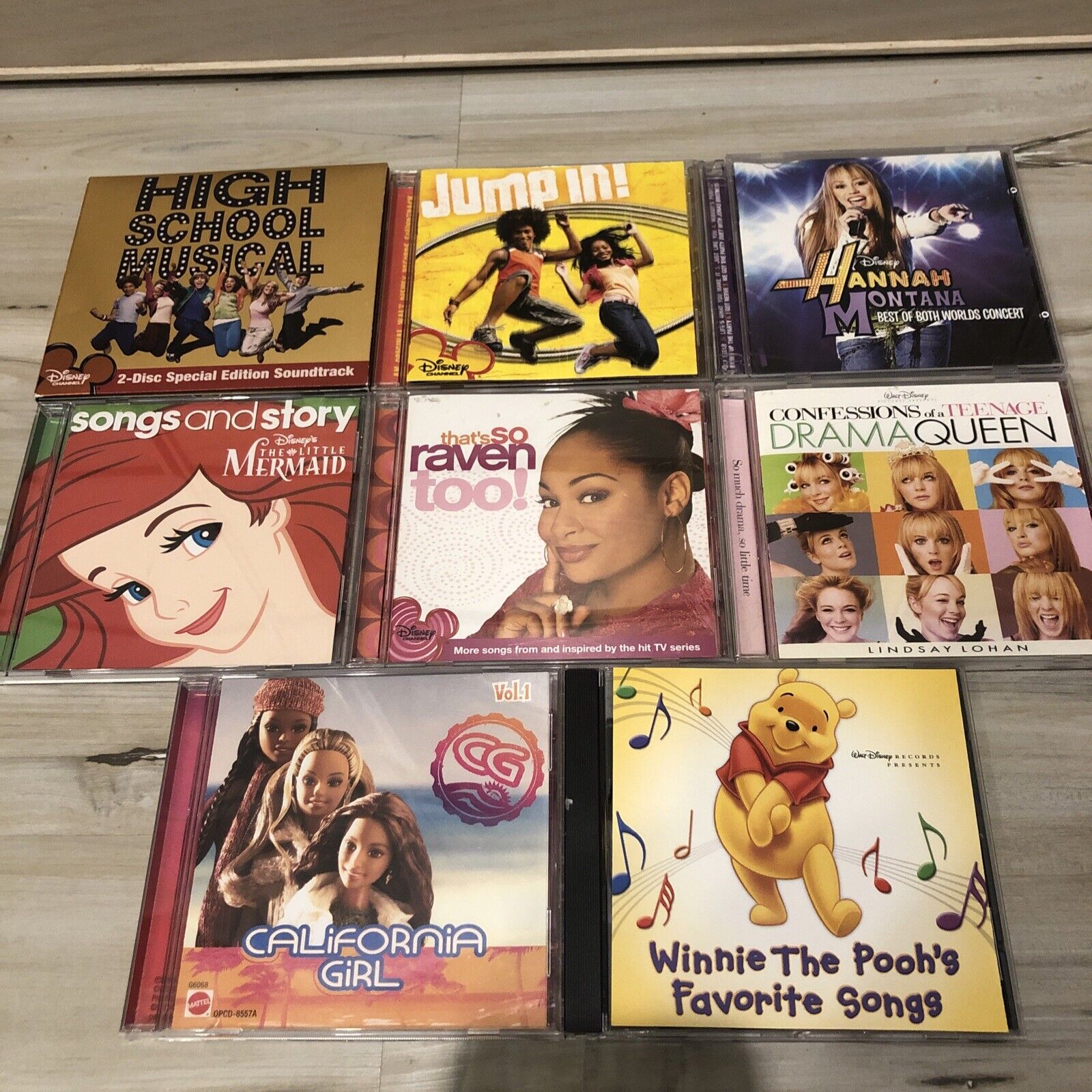 10 DISNEY CD DVD W/ Barbie California Girl Jump In Hannah Montana Drama Queen 👑