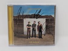 Jonas Brothers - The Album: HAND SIGNED AUTOGRAPH Album CD Nick Joe Kevin SEALED picture