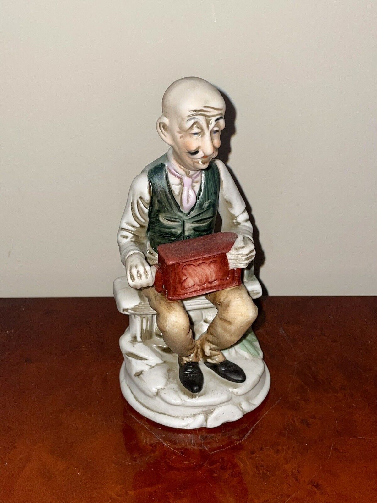 Vintage MCM Hand-Painted Sitting Old Man Holding Music Box Figurine 