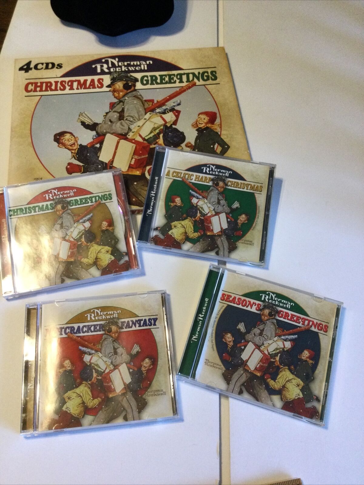 4 CD set Norman Rockwell Christmas Greetings, Christmas Songs