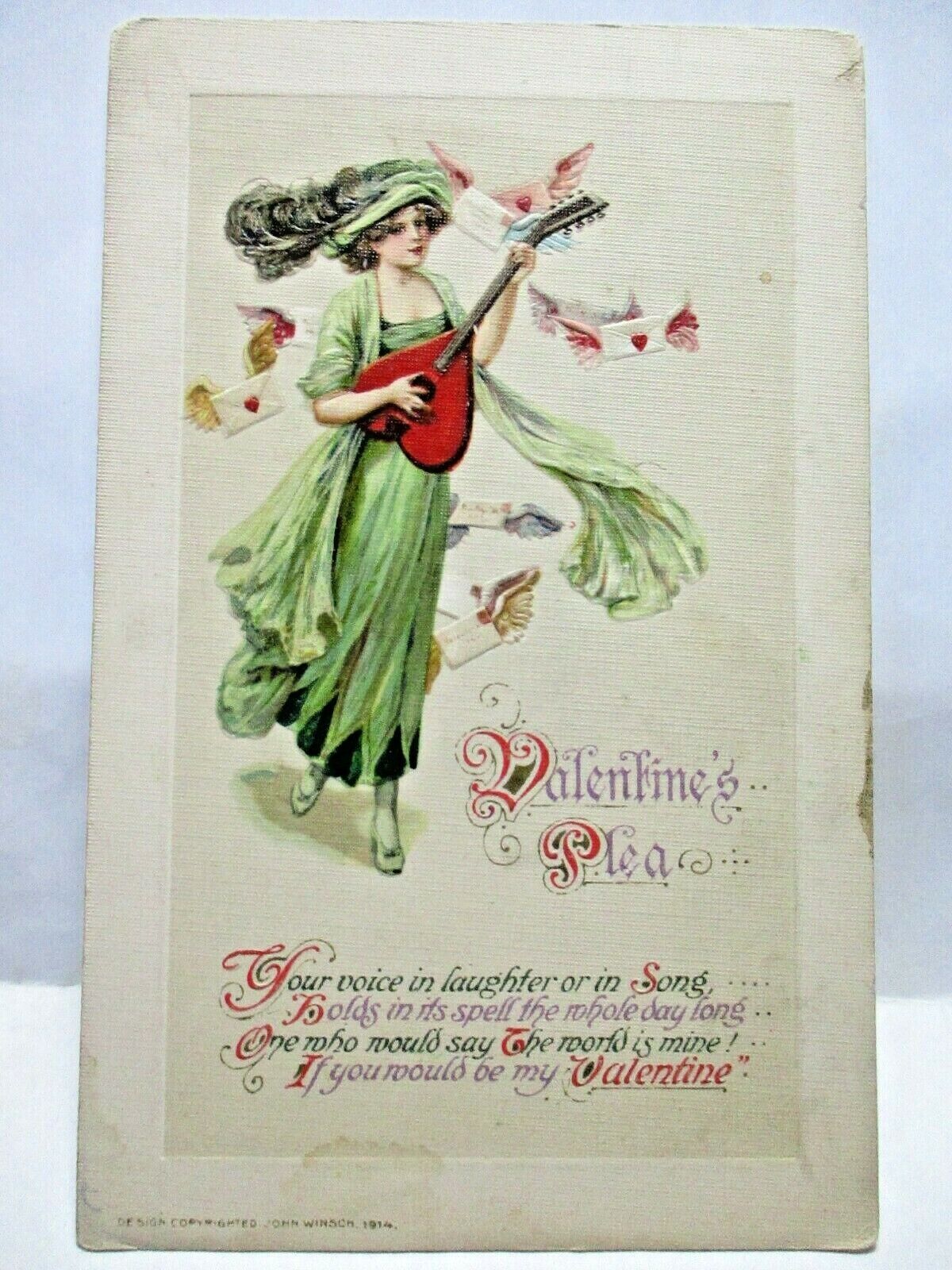 1914 JOHN WINSCH POSTCARD VALENTINE\'S PLEAS, LADY IN GREEN WITH HEART GUITAR