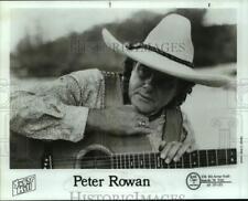 Press Photo Musician Peter Rowan Poses in Cowboy Hat With Guitar - sap51877 picture