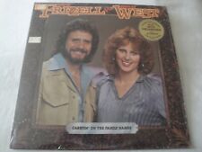 DAVID FRIZZELL & SHELLY WEST CARRYIN' ON THE FAMILY NAMES vinyl record 1981 picture
