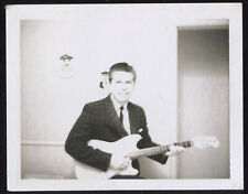 FOUND PHOTO Guitar Player Holding Fender Musicmaster? 1950s B&W Snapshot VTG picture
