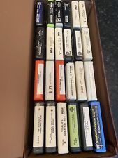 Lot of 24 8 track tapes and carrying case as is picture