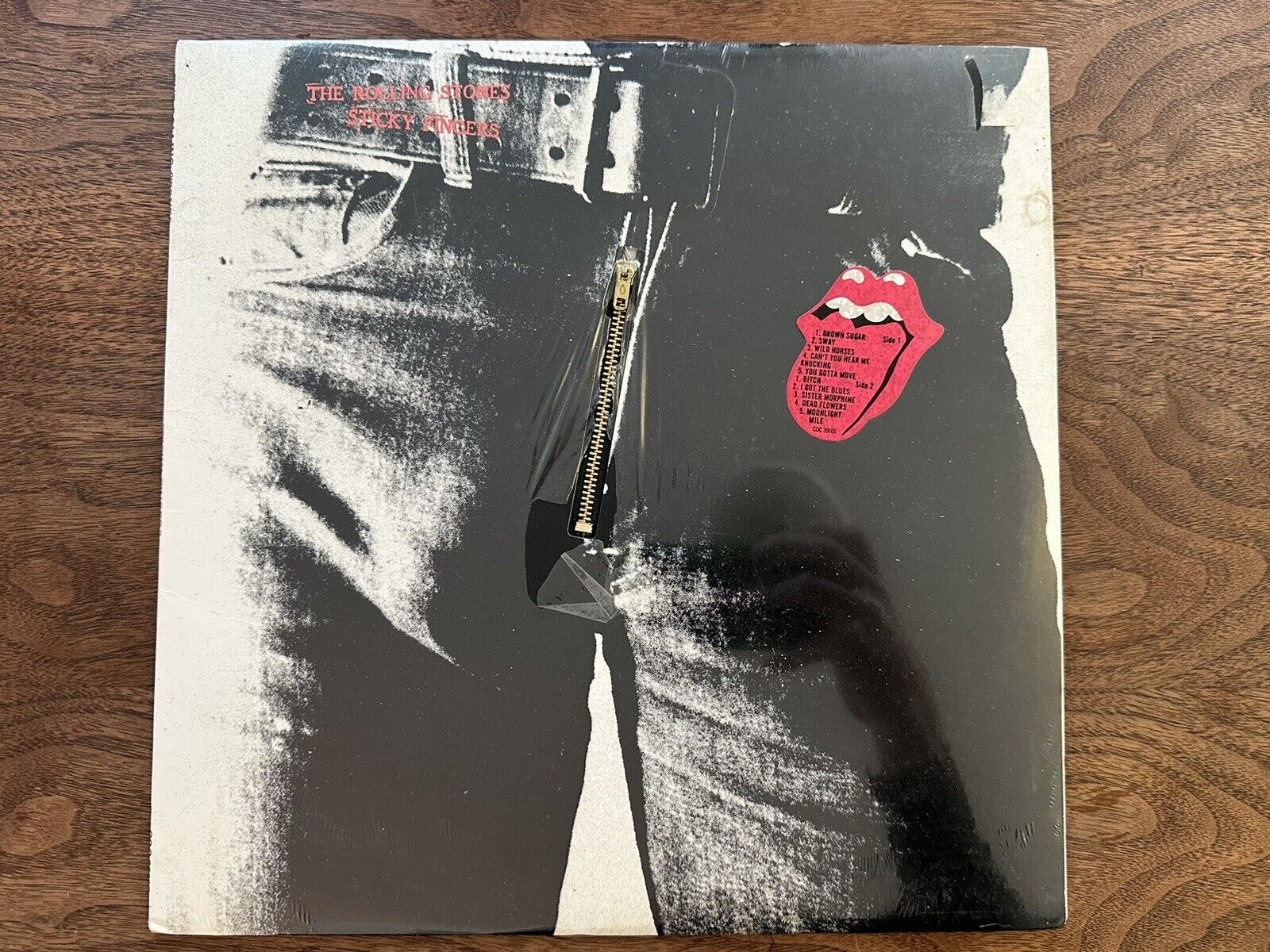 THE ROLLING STONES- STICKY FINGERS- FACTORY SEALED W/rare hype sticker🎸🤘🏼