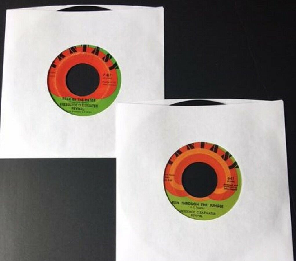 Vintage Creedence Clearwater Revival 2pk 45 rpm records – Good Used Condition 