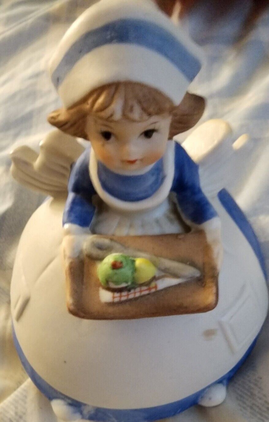 Vintage Ceramic Dutch Nurse Girl Rotating Music Box