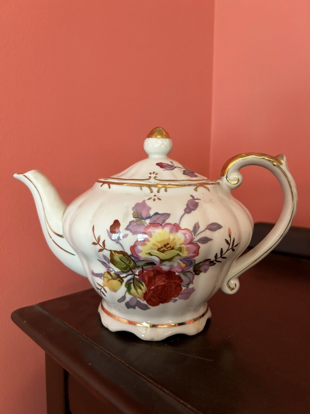 Vintage rose porcelain teapot with music box playing “Tea “For Two”