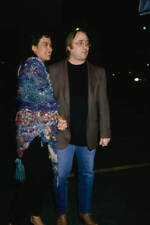 Stephen Stills and an unidentified woman attend an event 1990s Old Photo picture