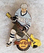 HARD ROCK CAFE PITTSBURGH HOCKEY PLAYER WITH YELLOW GUITAR AS STICK PIN # 62963 picture