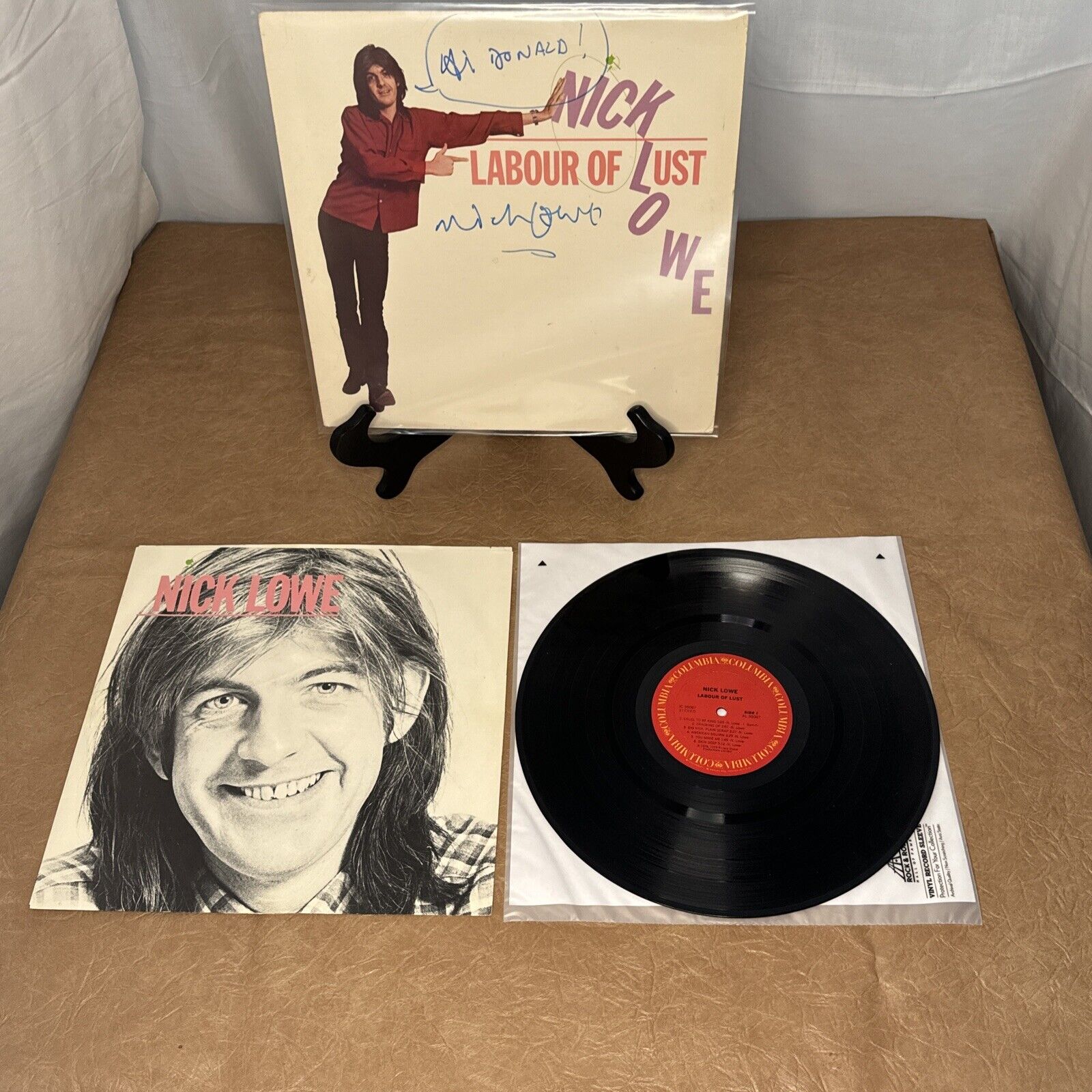 NICK LOWE SIGNED 3 TIMES LABOUR OF LUST VINYL RECORD