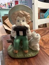 Vintage Porcelain BOY PLAYING HARMONICA with DOG FIGURINE picture
