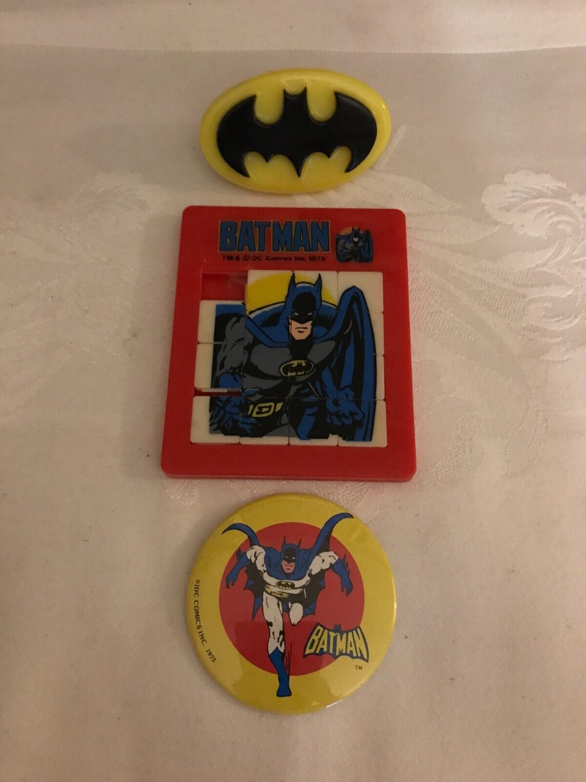 Batman DC Comics Bat Light, Batman Rubic's Cube Puzzle, and a Batman Button