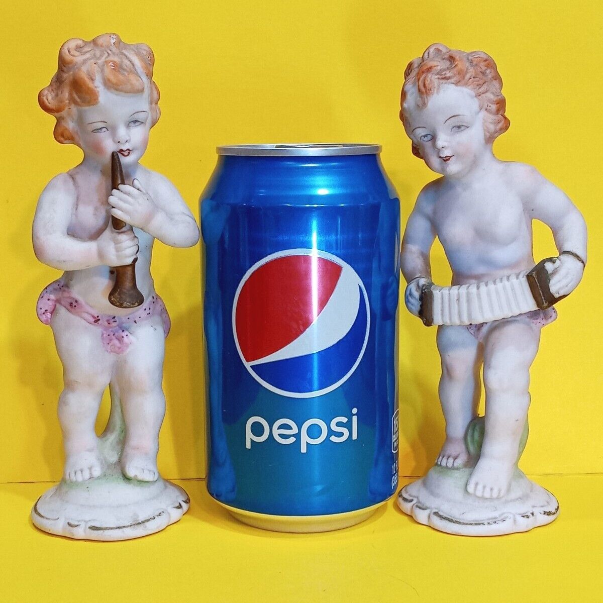 Pair Of Vintage Bisque Cherubs Playing Musical Instruments, Flute & Accordian