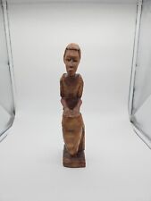Handed Carved African Wooden Statue. Man Beating Drums. picture
