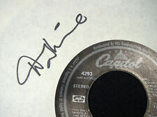 Denny Laine Signed White Paper Record Sleeve with 1976 Wings 45 Record Inside picture