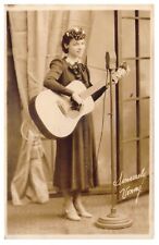 RPPC – RADIO PERFORMER HOLDING A MARTIN D-18 GUITAR – CA. 1940’S picture