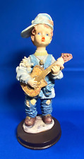 Boy Playing Guitar Figurine 8
