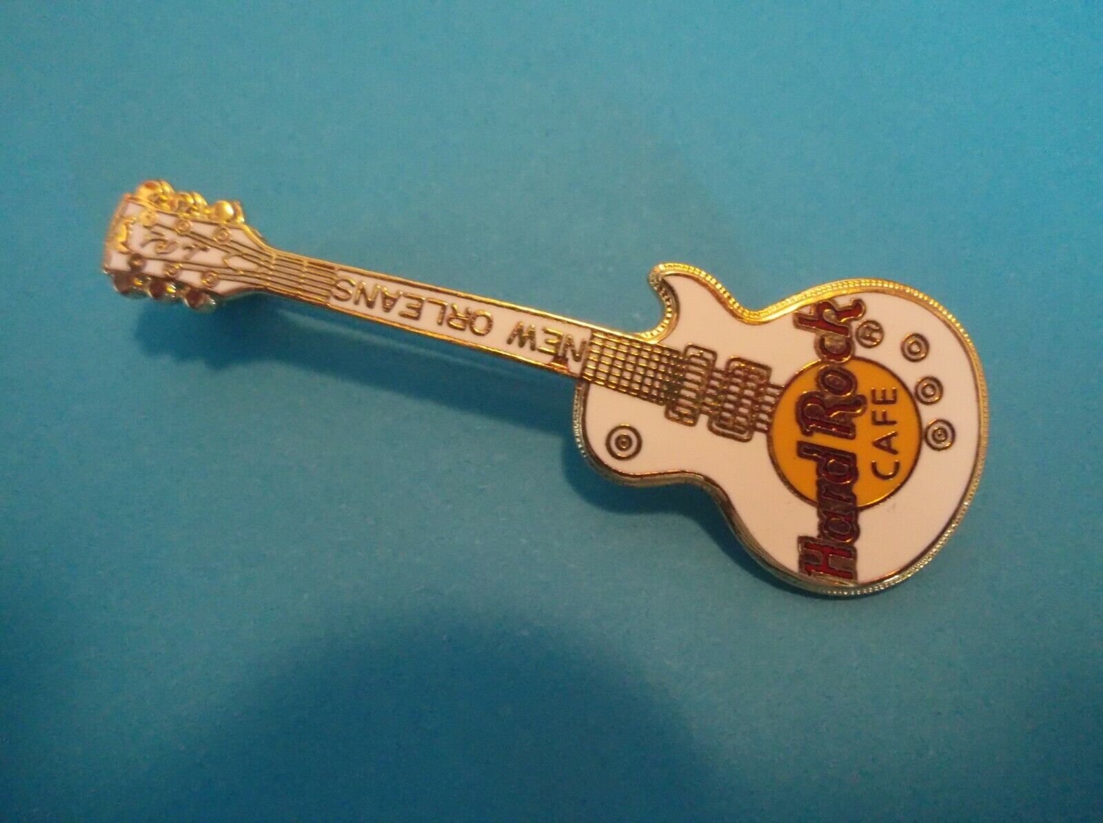 Metal Hard Rock Café Guitar Brooch from New Orleans white enamel front Cond Exc
