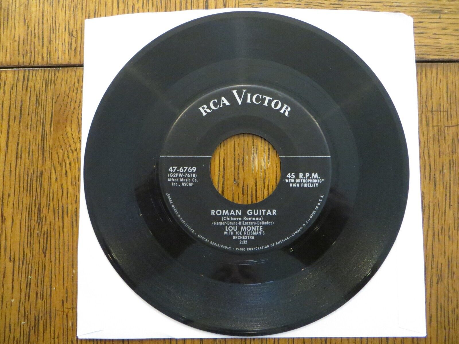 Lou Monte – Roman Guitar / Some Cloud Above - 1956  RCA Victor 47-6769 7\
