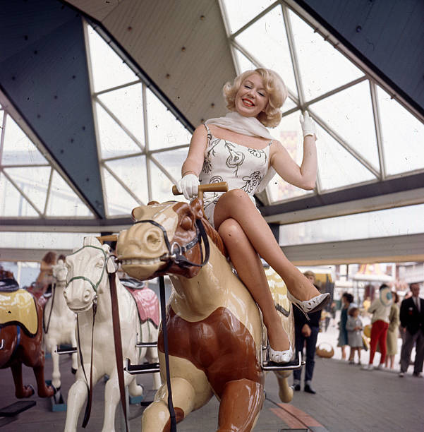 Singer Kathy Kirby Posed Sitting On A Fairground Carousel Hors 1960s Old Photo