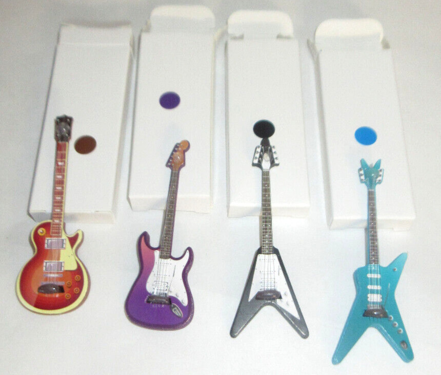 4 Miniature Rock Guitars 3.25\