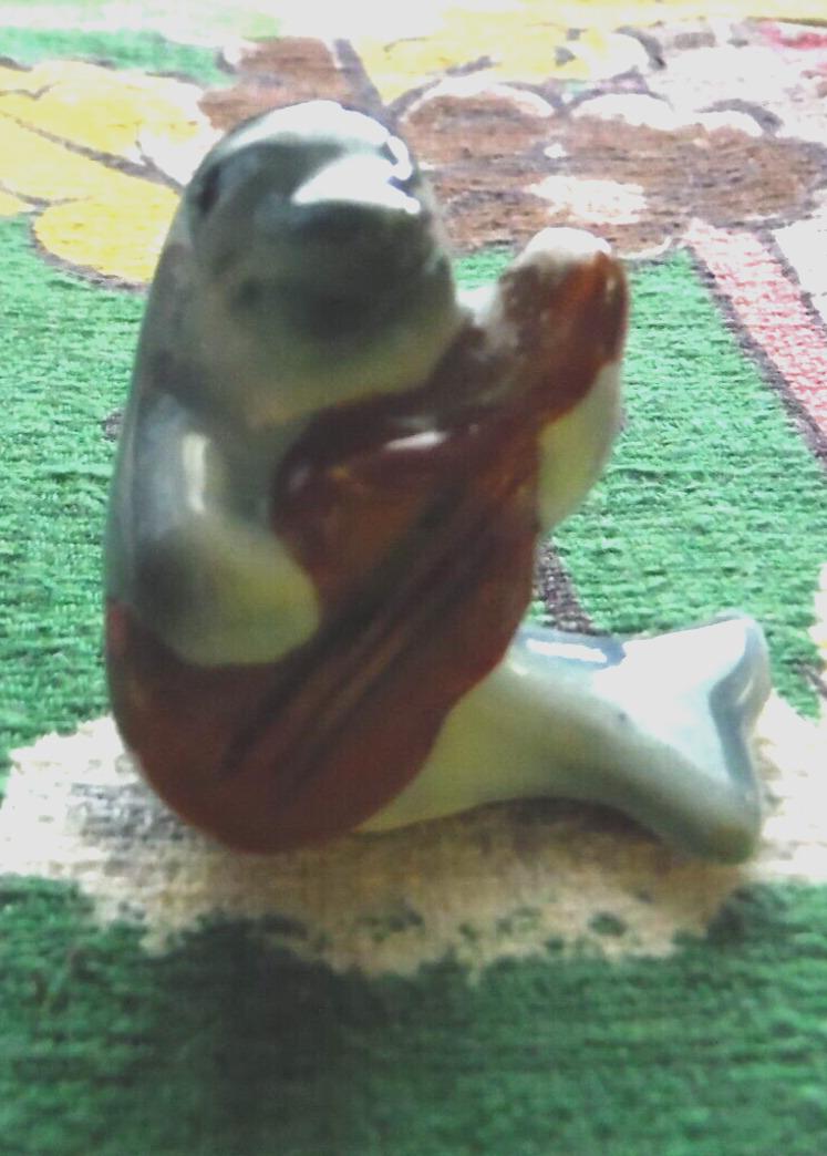 Vintage tiny dolphin playing a guitar figurine Japan