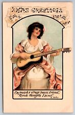 Christmas Greetings Lady Guitar Music Victorian UDB Postcard picture