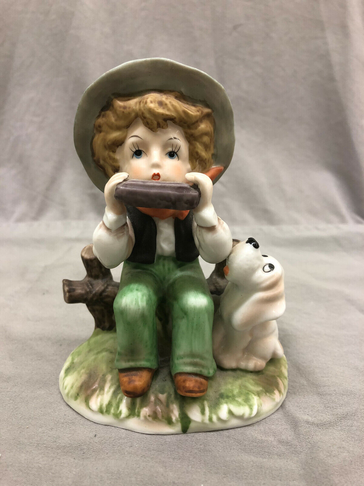 Vintage Hand Painted Ceramic Boy Playing Harmonica with his Dog