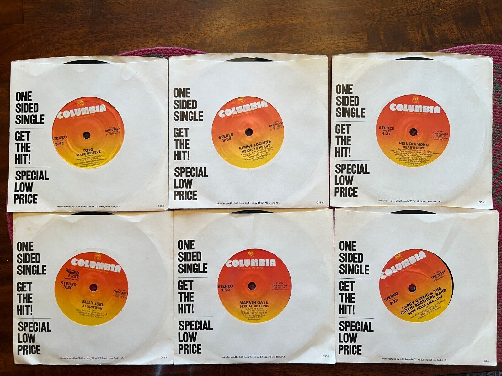 Group of 12 One-Sided 45RPM Records from 1981-1982