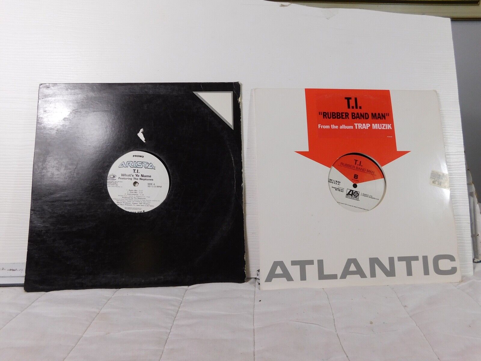 A PAIR OF (2)   T.I.      12 INCH SINGLE  33 RPM RECORDS