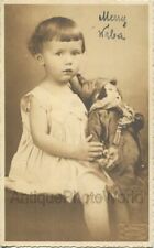 Funny girl posing with porcelain doll jester with guitar antique toy rppc photo picture