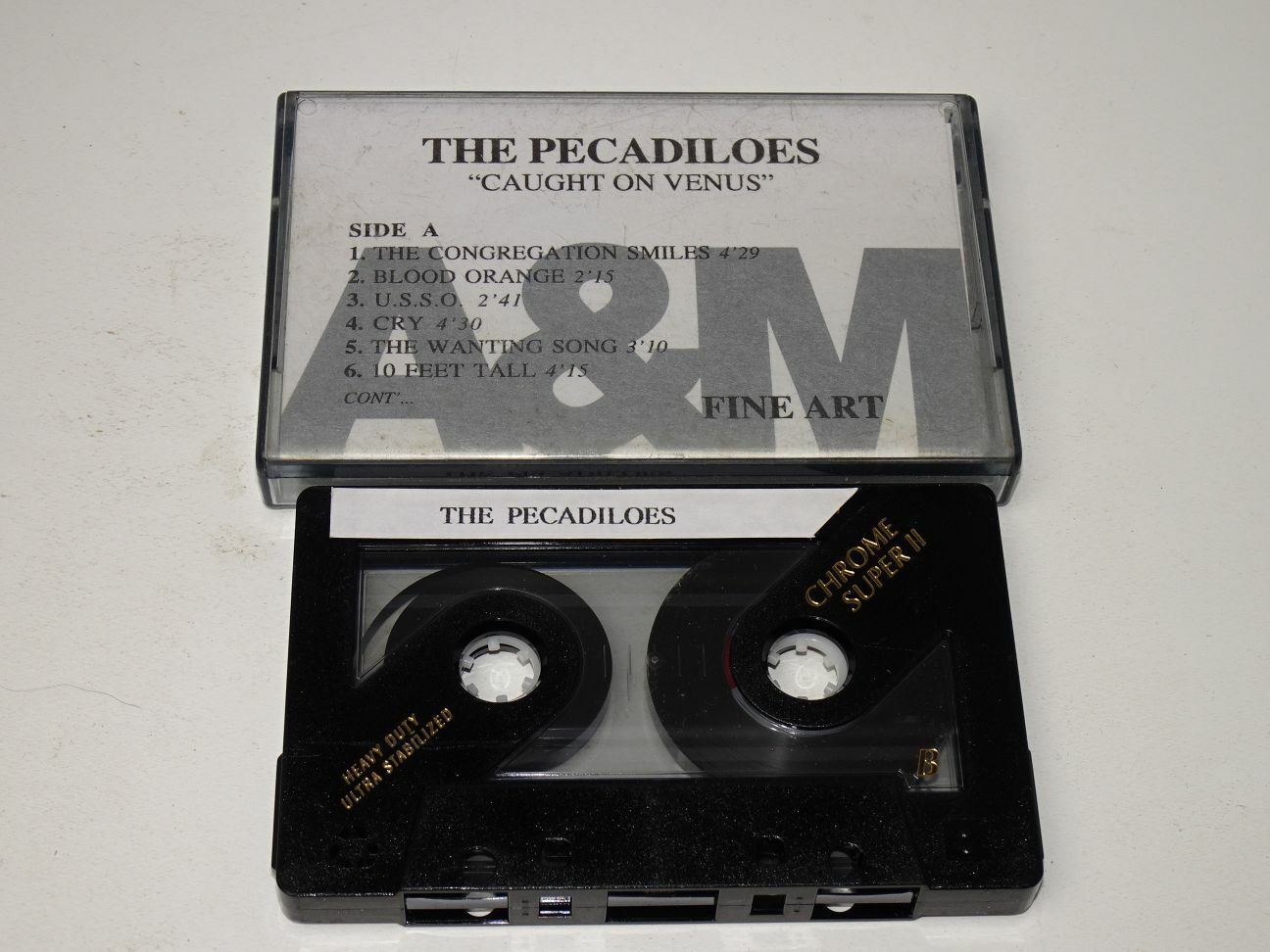 The Pecadiloes:  Caught On Venus  orig UK  PROMO PRE RELEASE   Cassette