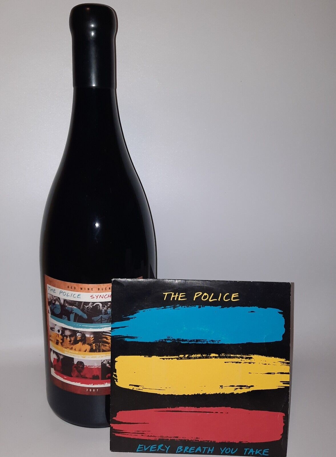 THE POLICE SYNCHRONICITY WINES THAT ROCK EMPTY WINE BOTTLE & 45RPM VINYL RECORD