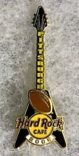 HARD ROCK CAFE PITTSBURGH BLACK FLYING V GUITAR SPINNING FOOTBALL PIN # 36201 picture