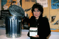 Yoko Ono poses with a garbage pail as a self-effacing comment on - Old Photo 4 picture