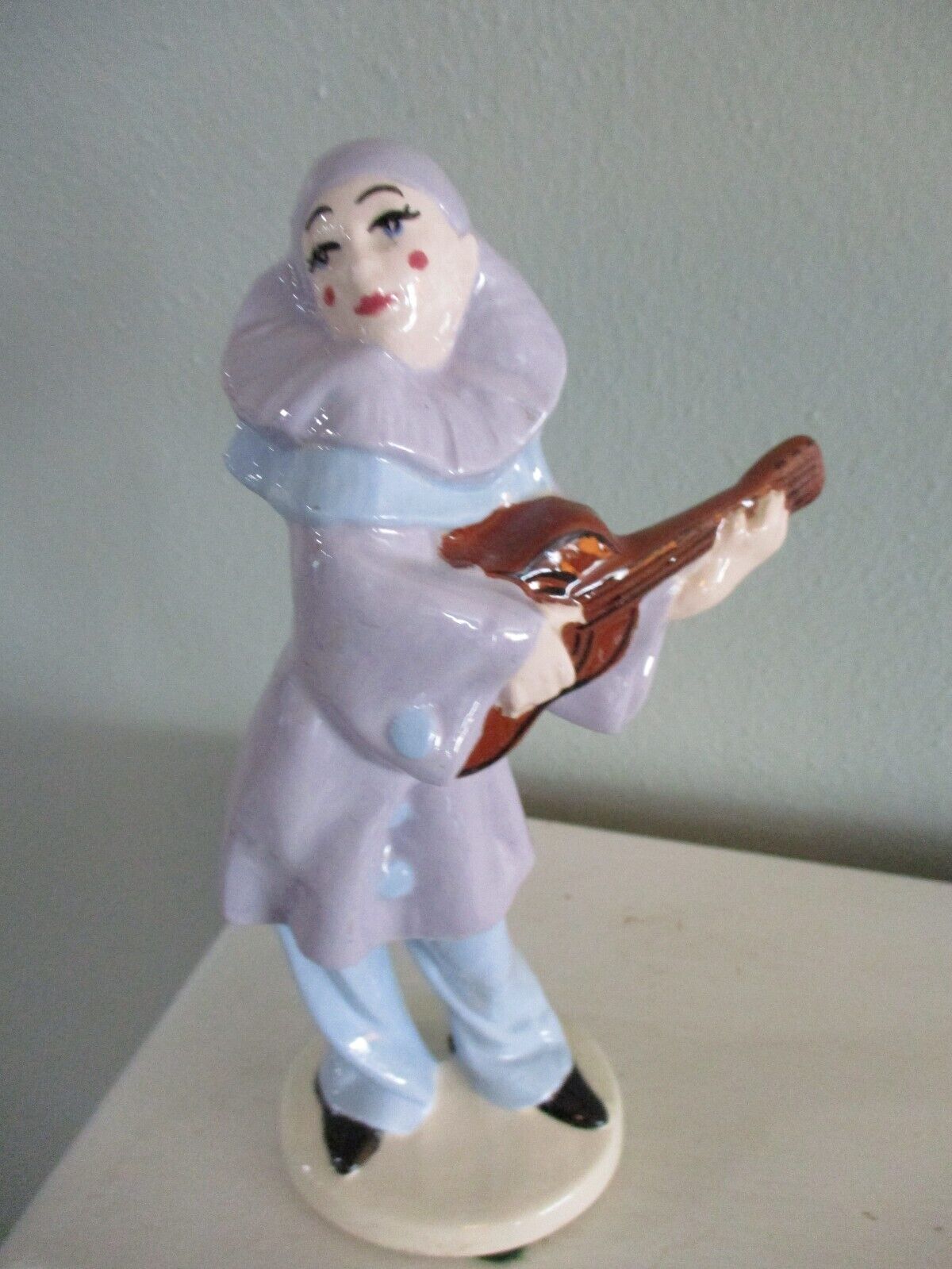 Porcelain Jester, Minstrel playing Mandolin Guitar signed 7\'\' clown figurine