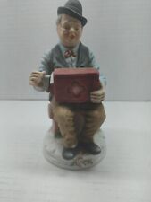 Vintage Porcelain Old Man With His Music Box picture