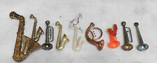Lot of Vintage Musical Instruments Saxophones and Horns Some Make Tooting Sounds picture