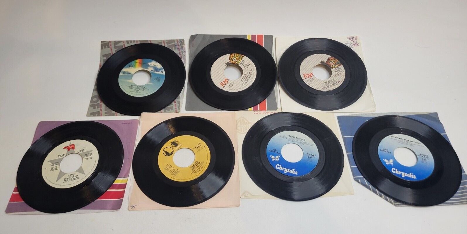 Vintage 45 RPM Vinyl Records Lot Of 7 Eagles Clapton Benatar Mellencamp 