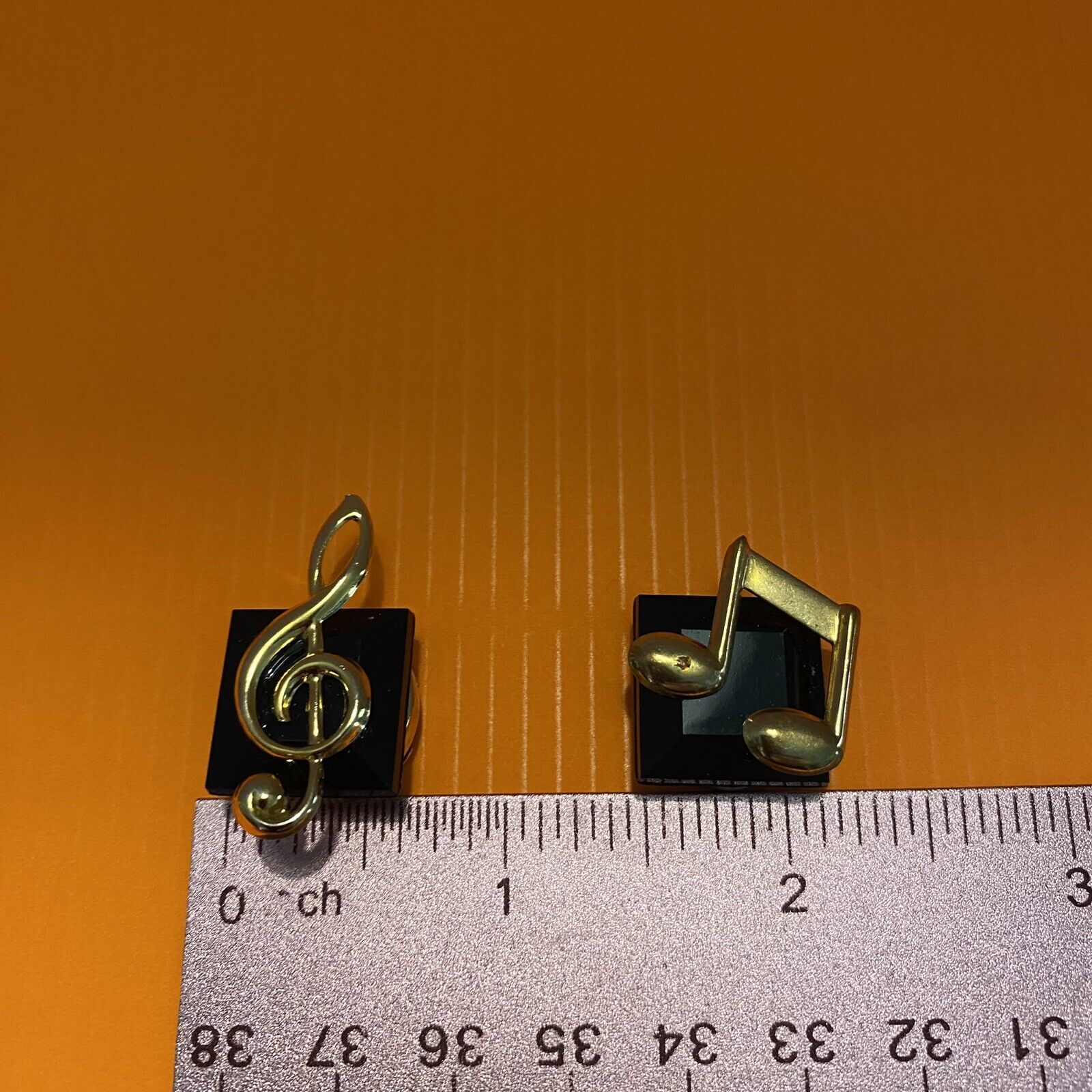 Vintage Set of two Button Covers Black with a gold Music note.