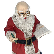 Santa Figure Gifts￼ Presents Toys Presents Train Clown Drum Checking His List picture
