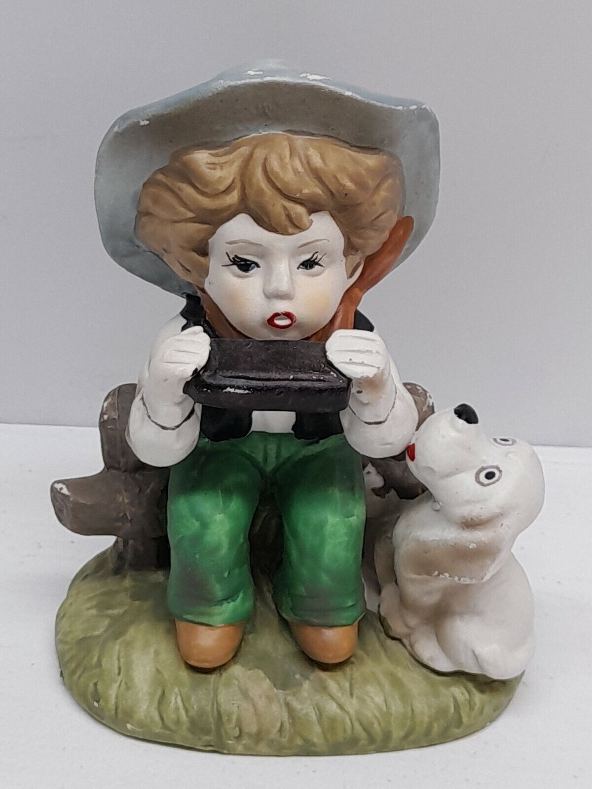 Ceramic Bisque Figurine Boy Sitting on Fence Playing Harmonica Singing w/ Dog