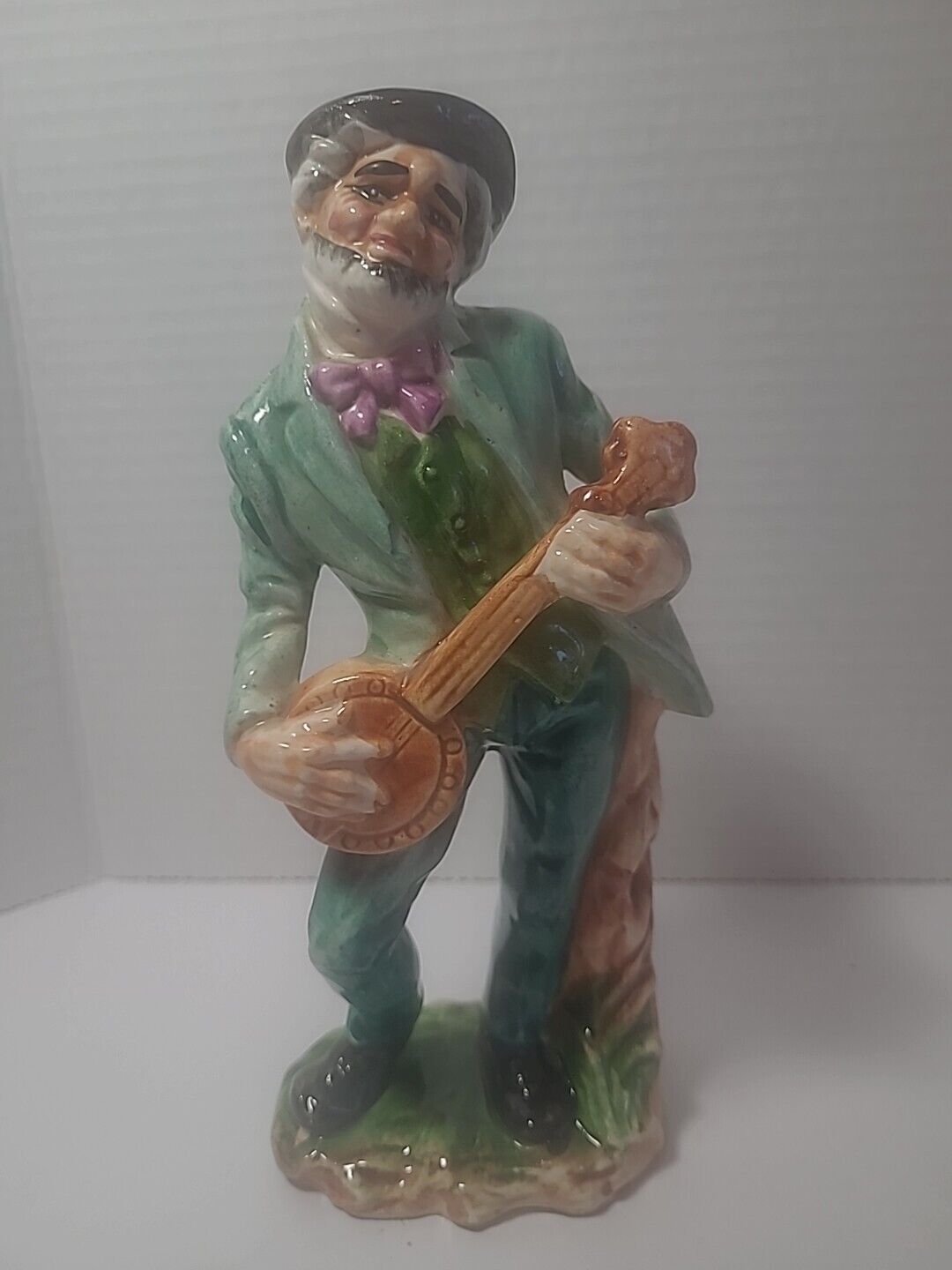 Ceramic (9 in) Man Playing A Banjo. Handcrafted  In Haiti.