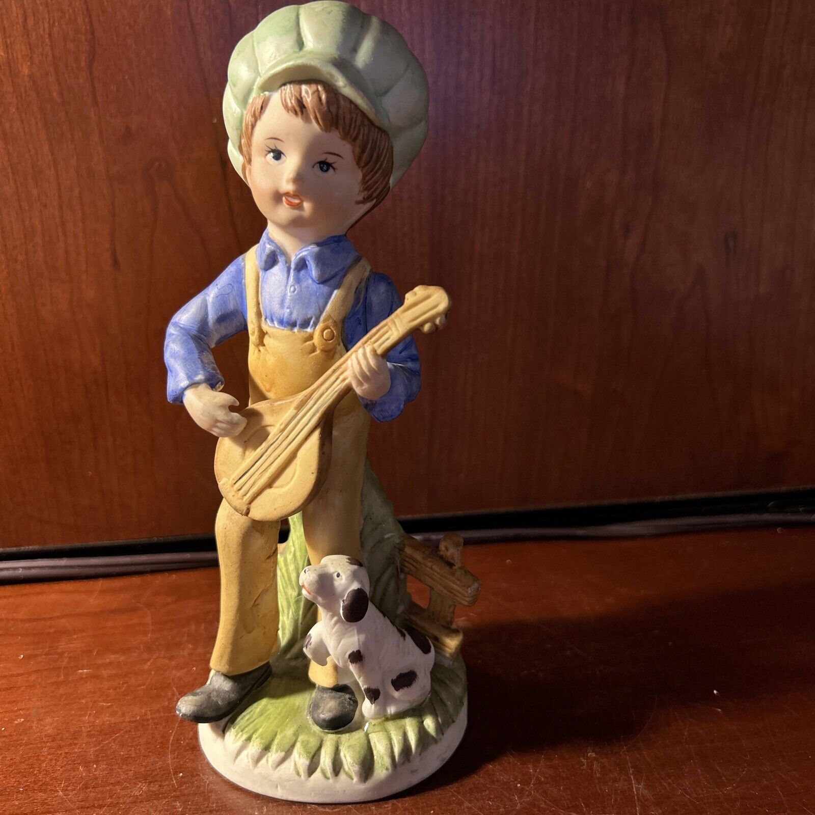 Vintage Glazed Porcelain Boy Playing Banjo with Dog Figurine