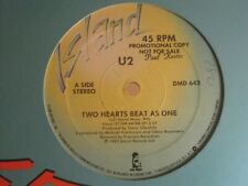 U2 TWO HEARTS BEAT AS ONE 12