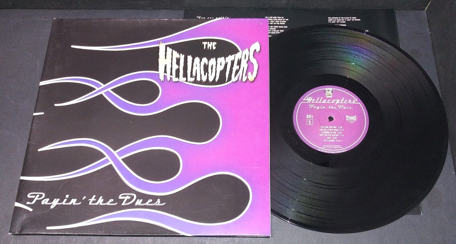 Vintage hard rock lp THE HELLACOPTERS Payin the Dues 1997 White Jazz embossed EX