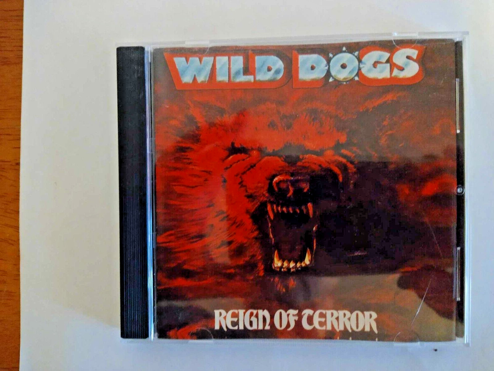 Wild Dogs CD Reign of Terror     Gently Used Hard Rock and Metal